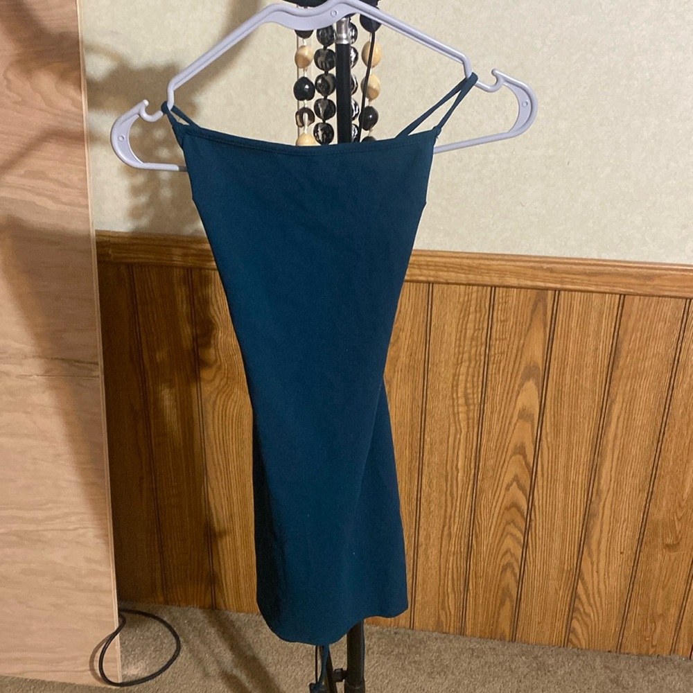 Dark green party dress, ties in the back .